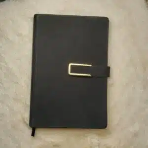 Golden buckle leather notebook with premium closure, ideal for corporate gifting and executive use