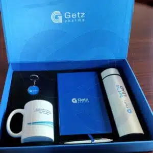 Executive corporate gift box with leather journal and branded pen from CGS