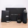 Prime executive gift box with leather notebook, black mug, glass bottle, pen, and keychain from CGS